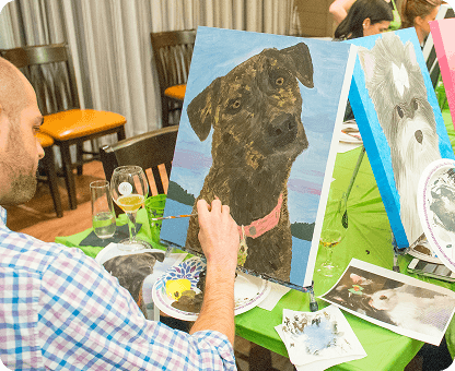 Paint and sip experience featuring paintings and group activities