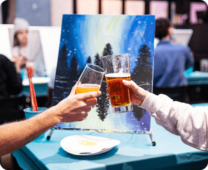 Paint night event showcasing creative artwork and social atmosphere