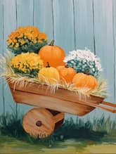 Rustic Wheelbarrow and Fall Pumpkins thumbnail